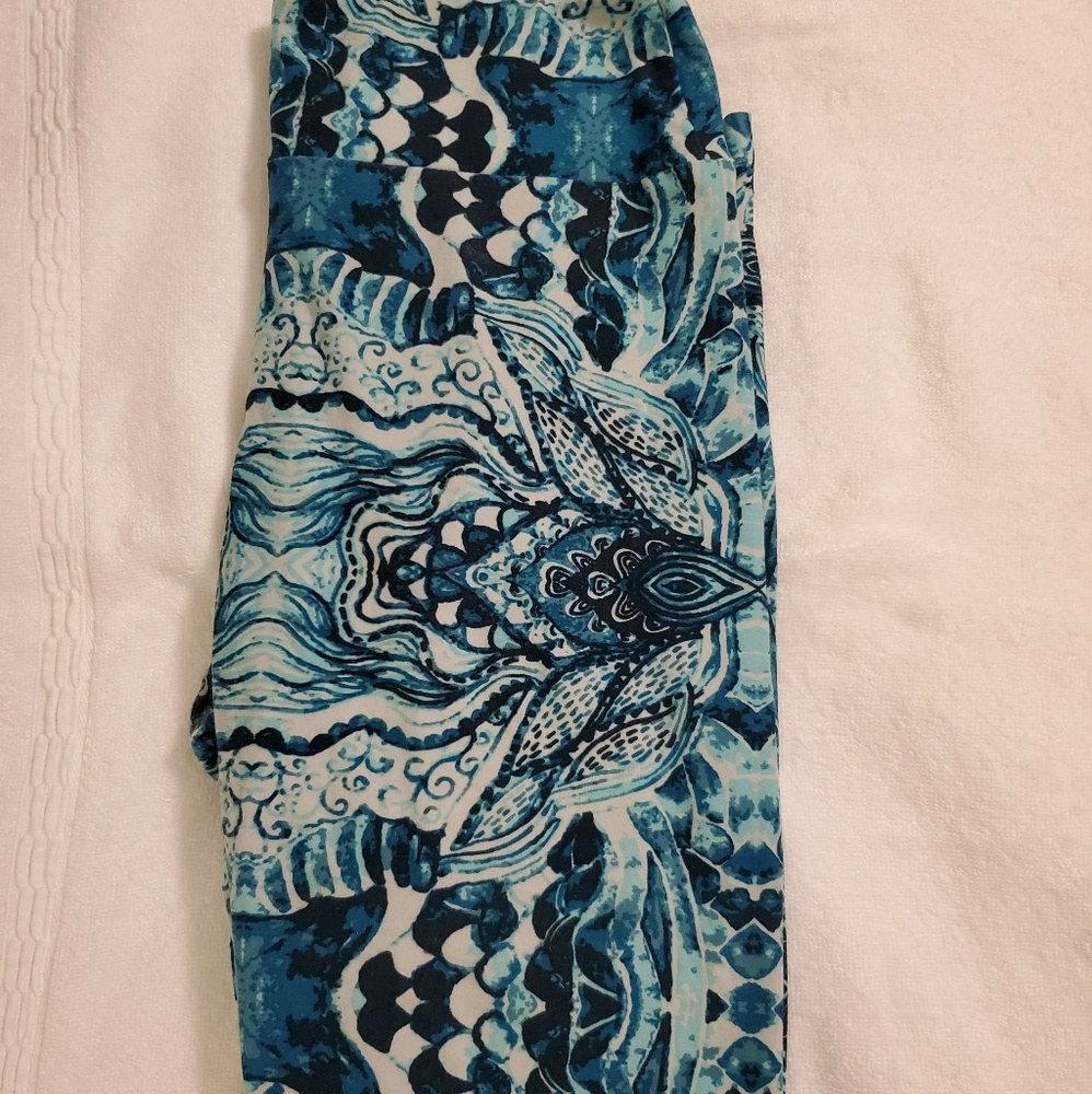 Legging à motif géométrique. Défaut : micros taches à l'arrière